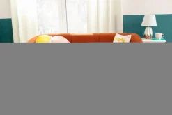 Sofy^Sofa na wysokich nóżkach ruda OLIVIO